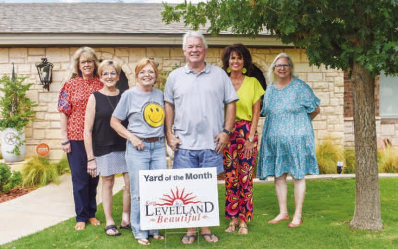 AUGUSTYARD OFTHE MONTH - The Keep Levelland Beautiful Program recognized Home of Farley and Jane Cook at 227 Cottonwood on August 15. Pictured from left to right are: Mary Siders, Barbra Pinner, Jane and Farley Cook, Cristal Isaacks and Donna Wheeler. (Photo courtesy of Emily Campos)