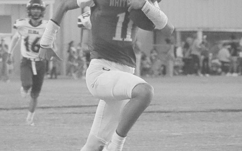 CAN’T KEEP UP - Whiteface Antelope Cesar Chavez caught the ball in stride this past Friday for a receiving touchdown against Elida during the team’s homecoming game. (Staff photo by Aalijah Soliz)