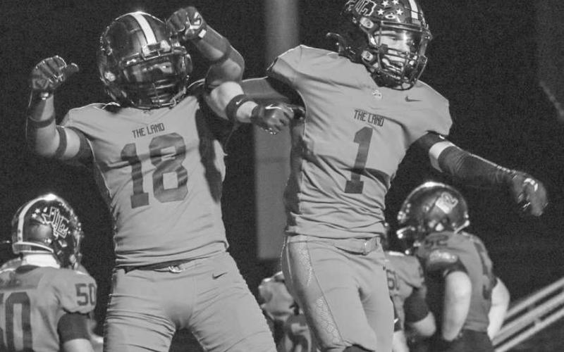 DUO - Levelland Lobos Noah Martin and Kaden Brogden celebrated their touchdown this past Friday during the team’s game against Lake View. (Staff photo by Aalijah Soliz)