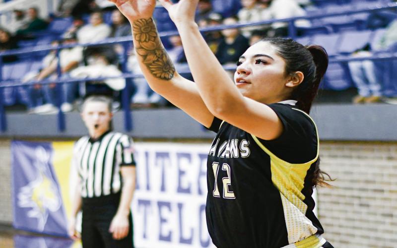 MARQUEZ SHOOTS FROM DEEP - Morton Maiden J’lynn Marquez shoots a threepointer during their away game at Whiteface this past Tuesday night. (Staff photo by Jentezen Smith)