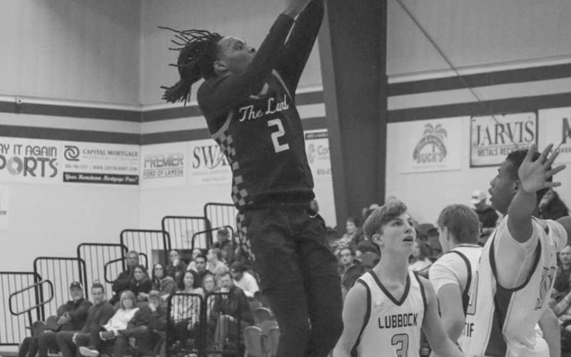 RUNNING START - Levelland Lobo Elijah Jordan got a running start for the floater against the Lubbock Christian Eagles on the road. (Staff photo by Aalijah Soliz)