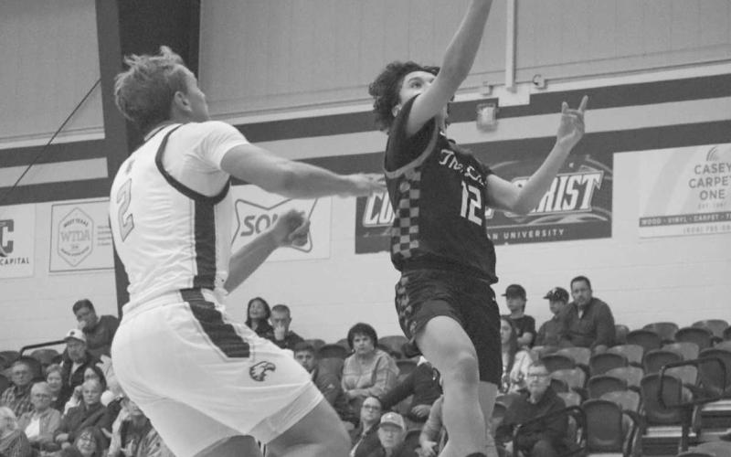 LAY-UP - Levelland Lobo Nehemiah Sanchez layed the ball up on the fastbreak during the team’s game against the Lubbock Christian Eagles. (Staff photo by Aalijah Soliz)