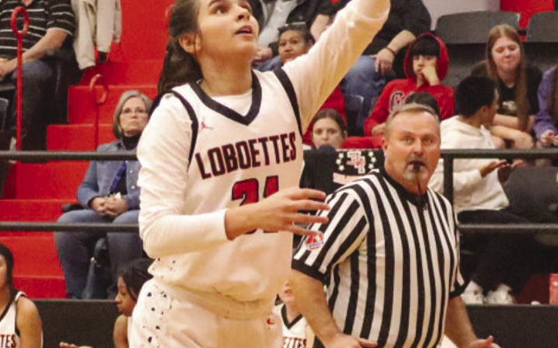 FAST BREAK - Levelland Loboette Leilani Sanchez had the break away speed to get down the court and lay the ball up during the teams win. (Staff photo by Aalijah Soliz)