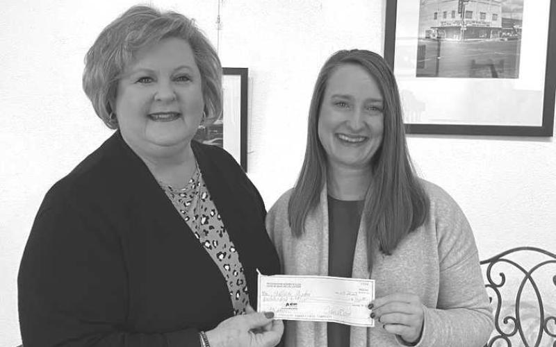DONATION TO WALLACE-- Progressive Women’s Club recently presented a donation to the Wallace Theater in support of the renovation and programming sponsored by the Wallace. Presenting the check to Alycyn Keeling was club member, Lynette Major. (Photo Courtesy by Lynette Major)