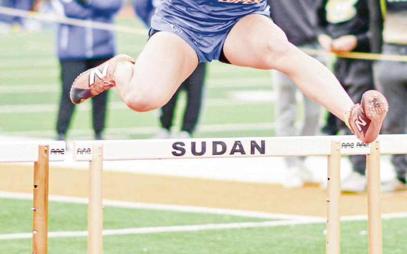 HURDLE FORM - Whiteface Lady Lope Arriana Soliz puts her hurdle form to use during a 100-meter hurdle race during the Son Qualls Relays this past Friday at Sudan High School. (Staff photo by Jentezen Smith)