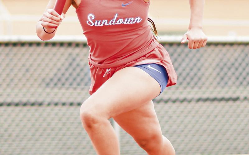 LEAD LEG - Sundown Roughettes JV 4x100-meter lead leg Evelyn Marchan drives out of the blocks during the race at the Son Qualls Relays this past Friday at Sudan High School. (Staff photo by Jentezen Smith)