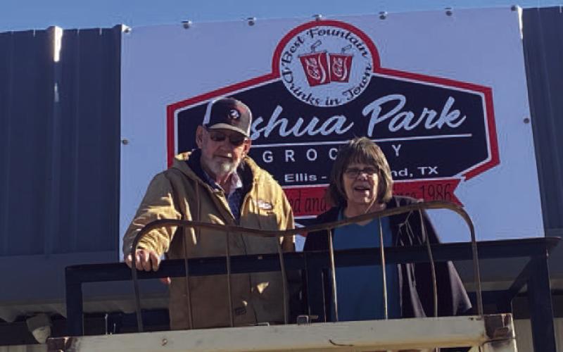 JOSHUA PARK GROCERY- Clifton and Carol Tuner were honored with the presentation of a sign commemorating the 38 years of service to the area. Carol and Clifton nave owned and operated the family oriented store since January 13, 1986. They are well known in Levelland and surrounding areas as having the best fountain drinks, friendly staff, and clean store. In photo are Clifton and Carol Turner.(Photo submitted)