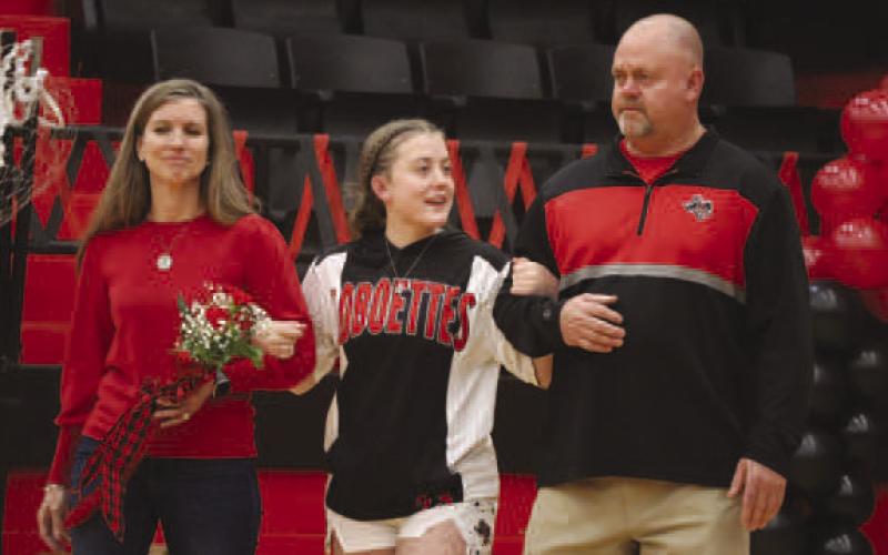 SENIOR - Levelland Loboette Maddie Stafford was walked out by her parents Mike and Anne Stafford this past Tuesday night for senior night. Maddie’s future plans include going to South Plains College, then go to nursing school to eventually become a pediatric nurse practitioner. Her advice to future players are “Be true to yourself and find the good in other people.” (Staff photo by Aalijah Soliz)
