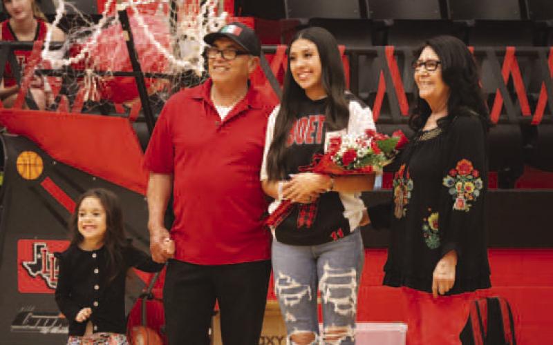 SENIOR - Levelland Loboette Kaydence Escarcega was escorted out by her parents Pouline and Manual Escarcega last Tuesday during senior night. Her future plans are to attend Lubbock Christian University to pursue a degree in nursing. Her advice for future players is “Strive to be the best version of yourself on and off the court.” (Staff photo by Aalijah Soliz)