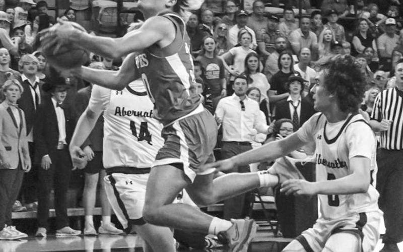 TOUGH FINISH - Ropes Eagle Branson Simental made the athletic layup during the team’s game at SPC to move onto the next round. (Staff photo by Aalijah Soliz)