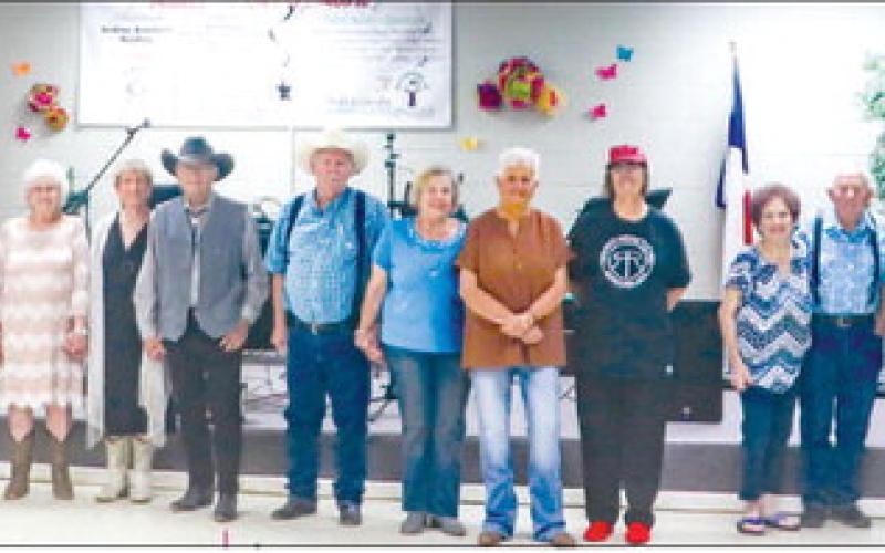 PROM TRADITION CREATED - The Hockley County Senior Citizen’s Association had a great turn out for their Senior Citizen Prom held on Friday at the Senior Citizen Dining Hall. Couples and friends lined up for a memorable picture before the party started. Hockley County Senior Citizen’s Director Shelly Baigen was excited to hold the first ever prom event and hopes it becomes an annual draw for senior citizens. (Staff photo by Hannah Woodrum)