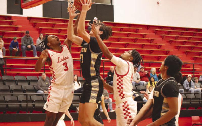 Levelland Lobo Eryk Jones blocked the ball during the teams game against the number two ranked team in 1A where they fell short against Jayton Jaybirds. (Staff photo by Aalijah Soliz)