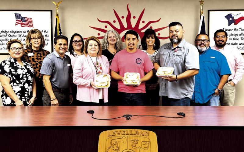Code Compliance Appreciation: (front, left to right) Angie Covarrubias, Tushar Bhakta, Dina Gaona, Joe Hernandez, Eli Colunga with member of the Chamber of Commerce and city officials.