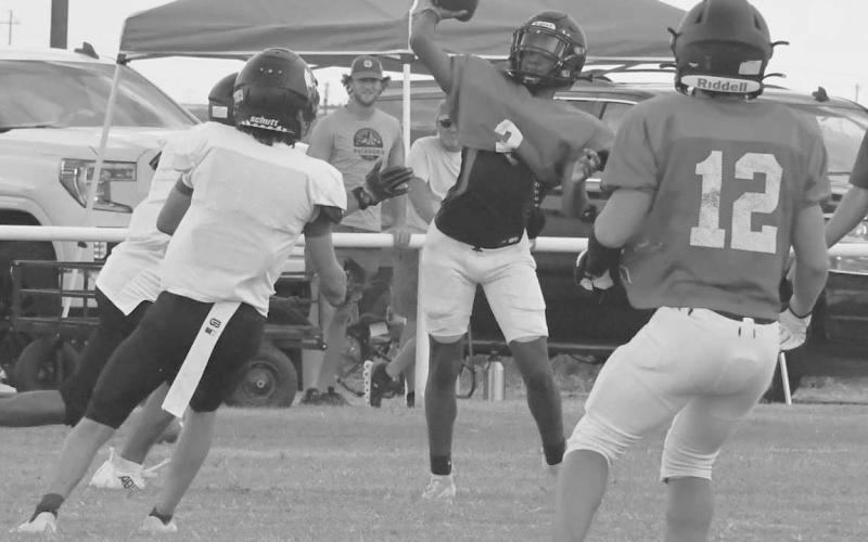 SCRIMMAGE PASS- Whitharral’s Brent Robinson went for a long pass in a scrimmage against the Lubbock Home School In Whitharral last Friday. Robinson and the Panthers will scrimmage in Petersburg next Friday at 5 p.m. (Photo Courtesy of Jay Kelley)
