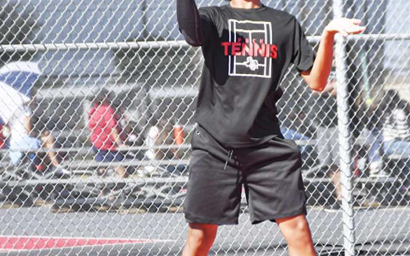 RIGHT BACKATYA– Diego Franco makes a play off of the opponents serve and sends it right back at them during a double’s tennis match against Lubbock-Cooper Liberty this past Tuesday at the Levelland