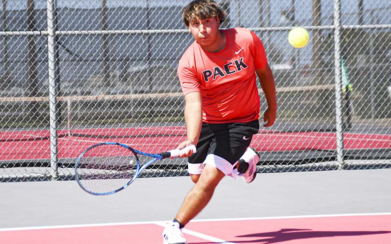 ON THE MOVE – Marc Muniz makes a play on the move during a tennis match against Lubbock-Cooper Liberty this past Tuesday at the Levelland tennis courts. (Staff Photo by Jentezen Smith)