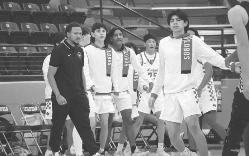 POSITIVE - The Levelland Lobos made sure to get their starters hype during the teams game against Bushland in the Littlefield Tournament last week. (Staff photo by Aalijah Soliz)