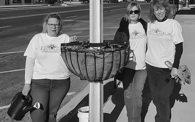 CHAMBER PLANTER - The Levelland Chamber of Commerce was represented at the Community Planting Day on Saturday. The event was hosted by the MainStreet Program that featured the planting of several hundred plants. Pictured from left to right are: Kelly Hancock, Maryan Moore and Mary Siders. (Photo courtesy of Andrea Corely)
