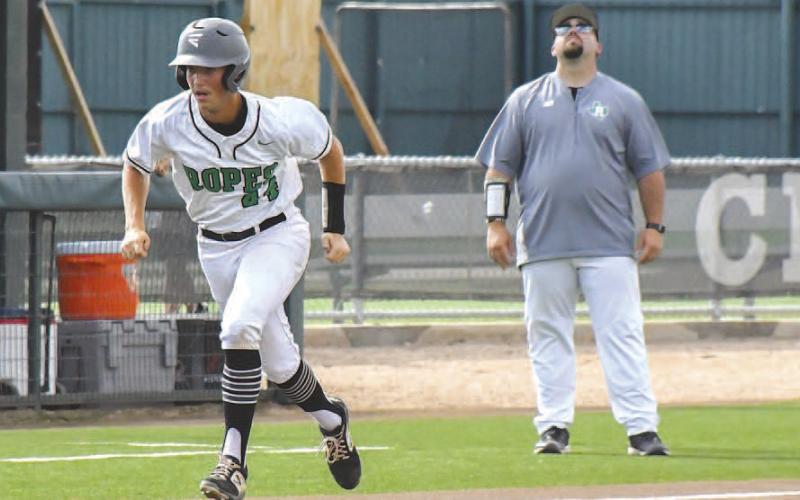 LEAD AT THREE- The Ropes Eagles lost to Hawley two games to none in the UIL Regional High School Baseball Semifinals Thursday and Friday in Midland. The Eagles’ end their season as district runners-up, bi-district champions and regional quarterfinal champions. Eagle base runner Braxxin Partington got a big lead down the third baseline during the contest. (Staff Photo by Dom Puente)