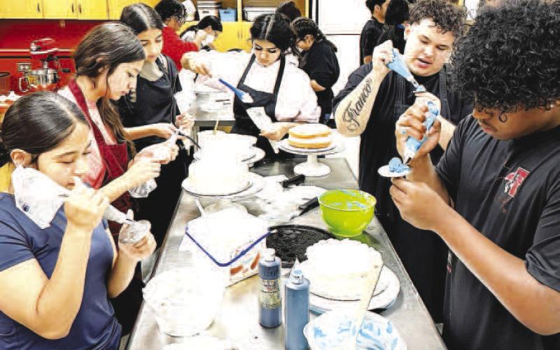 MAKING COOKIES- Levelland High School culinary students in Khris Oaks’ class have been sharpening their knives and decorating skills for the upcoming cake competitions to come up with elegant delectable creations. (Levelland ISD photo)