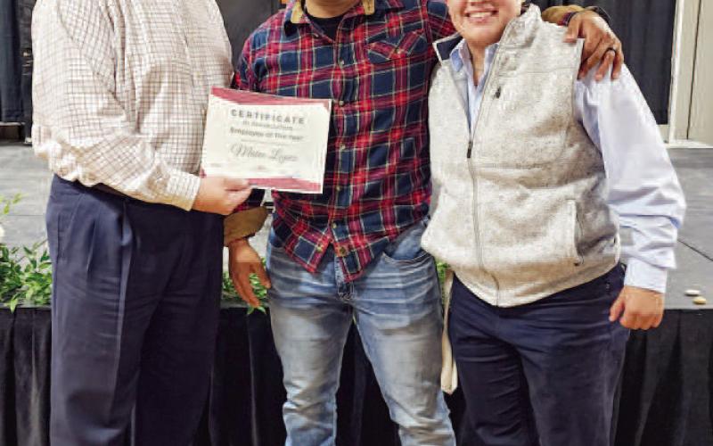 EMPLOYEE OFTHEYEARAWARD - During the City of Levelland’s Employee Appreciation Banquet, Thalia Guerrero presented the Employee of the Year Award. The recipient of the award was LPD’s Captain Mateo Lopez. Guerrero shared the positive impact Lopez has had on her throughout the past year as she has undergone an internship with the department. Pictured is City Manager James Fisher alongside Lopez and Guerrero. (Staff photo by Dom Puente)