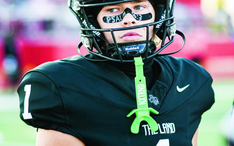 PSALM 56:3 - Levelland’s Kaden Brogden stares off with “Psalm 56:3” written across his eye black for a home football game in October. (Staff photo by Jentezen Smith)