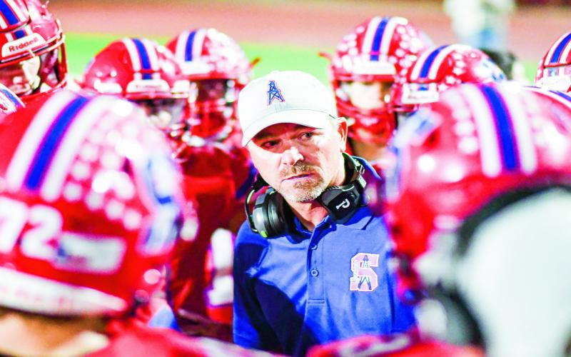 SHEER INTENSITY - Sundown Football Head Coach Brannon Rodgers intensely addresses his team during a timeout in their home game against Plains in October. (Staff photo by Jentezen Smith)