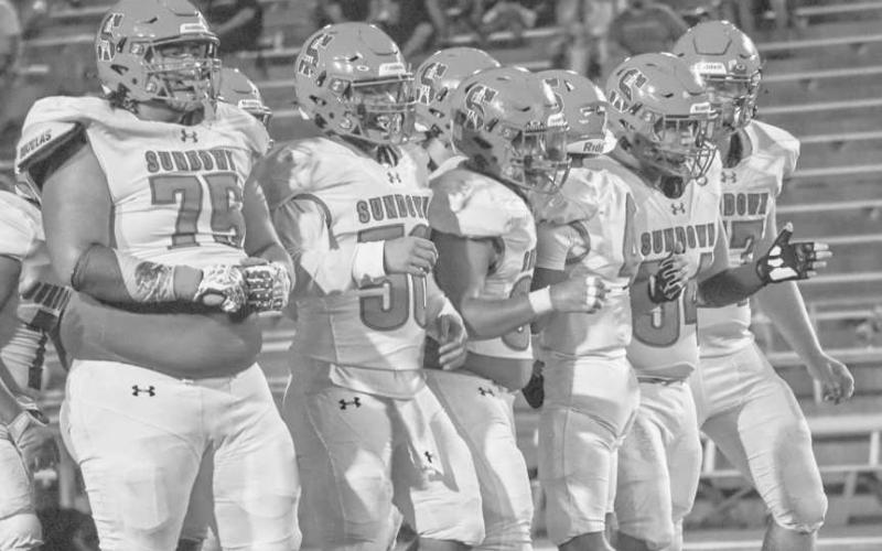 BIG DOGS - The Sundown Roughnecks run game was doing well because of their offensive line being able to move around anyone they wanted. Pictured above is the offensive line breaking their huddle this past Thursday against the Fighting Irish. (Staff photo by Aalijah Soliz)