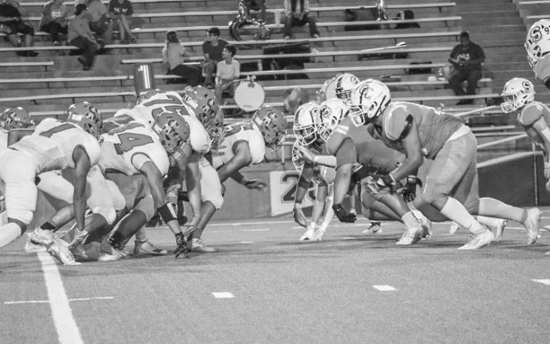 HEAD TO HEAD - Both teams got ready to go at it for the fourth down conversion by the Roughnecks this past Thursday in Canyon against the Shamrock Fighting Irish. (Staff photo by Aalijah Soliz)