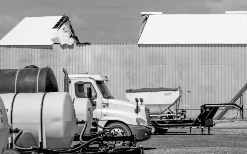 WRECKAGE – Buildings and structures of all sizes were affected by the severe storm conditions Levelland experienced early Wednesday morning. Pictured is a large structure along 1st Street missing a piece of its roof. (Staff photo by Karin Riddle)
