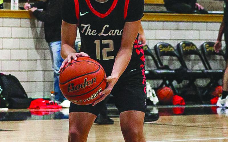 FREE THROW - Levelland Lobo Nehemiah Sanchez shot technical free throws during the team’s game agianst Snyder on the road. (Staff photo by Aalijah Soliz)