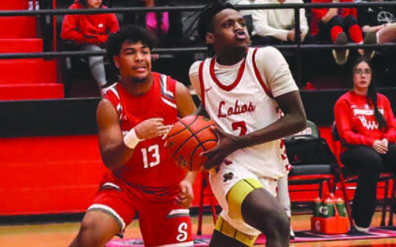 BLOW BY - Elijah Jordan blew past his defender during the teams contest last Tuesday against Sweetwater. (Staff photo by Aalijah Soliz)