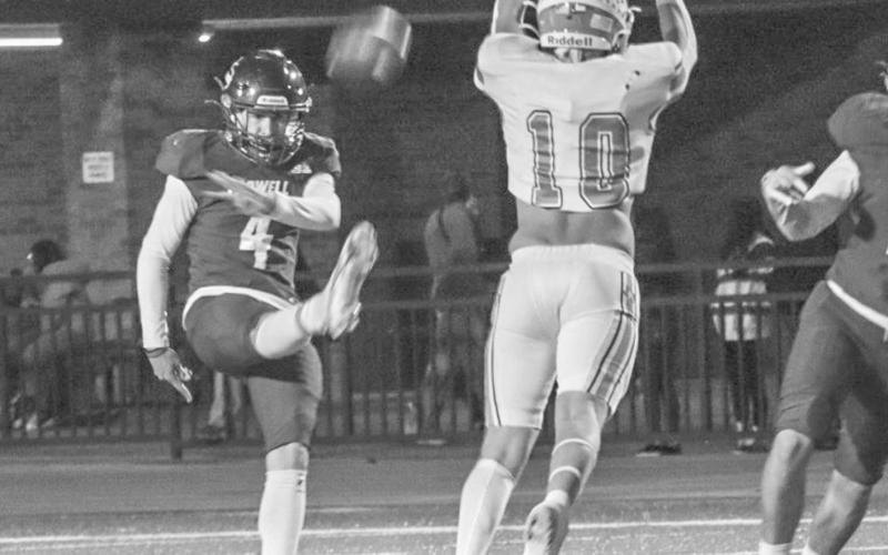 QUICK JUMP - Ropes Eagle Brady Bryan got a good jump off the snap to try to block the punt last Friday night in Sundown against the Steers. (Staff photo by Aalijah Soliz)