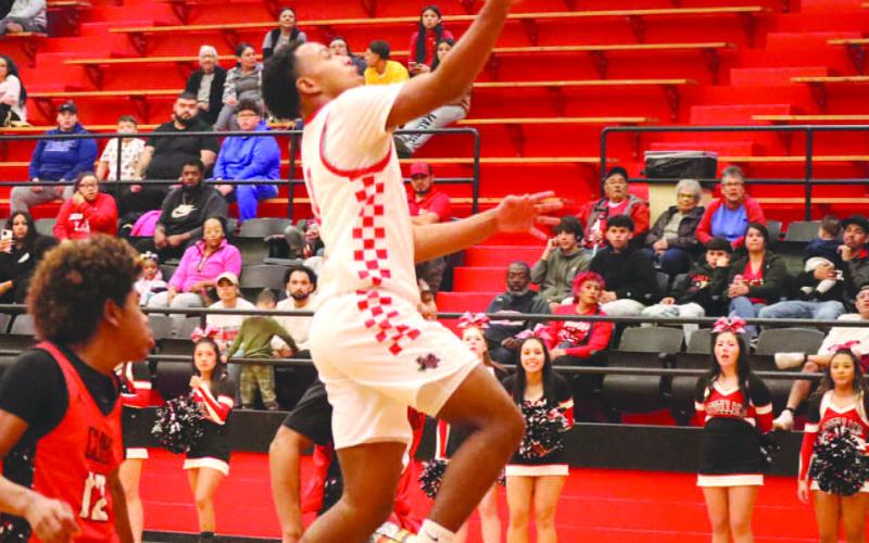 Levelland Lobo Jayden Castillo layed the ball up off of a Brownfield turnover during the teams contest. (Staff photo by Aalijah Soliz)