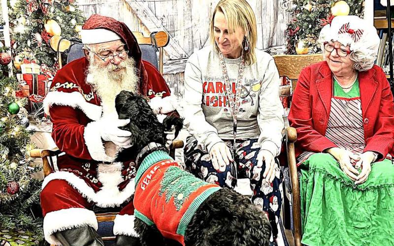 SMYER SANTA- Smyer ISD had a visit from Santa Claus and Mrs. Claus and Pepper the therapy dog. (Smyer ISD Facebook)