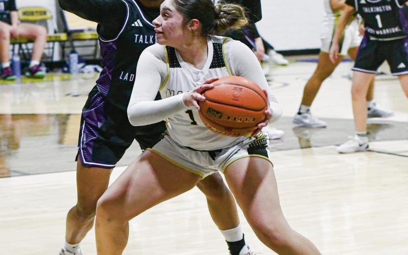 POST ‘EM UP - Morton’s Ada Torres posts up a Talkington defender during their basketball game this past Tuesday night at Morton High School. Torres would have two points, six rebounds and three steals in the Maidens win. (Staff photo by Jentezen Smith)