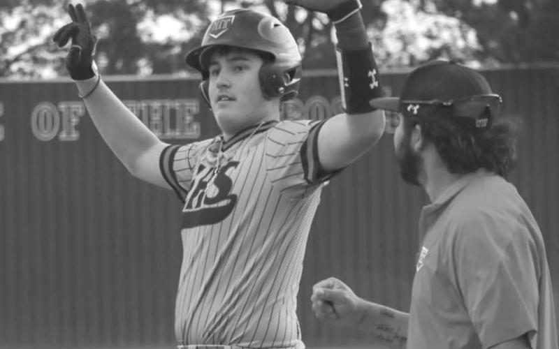 CELEBRATE - Levelland Lobo Brayden Moore celebrated with his team as he got on first base during his team’s game last Friday against the Sweetwater Mustangs at home. (Staff photo by Aalijah Soliz)