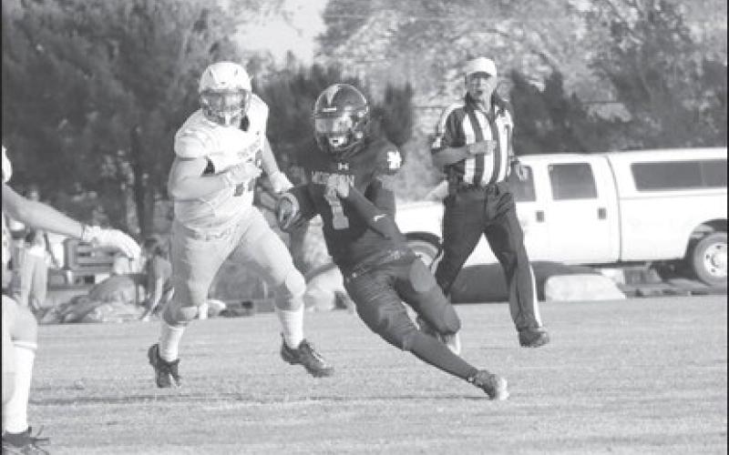 GOOD RUNNING - Morton quarterback Dante Chavez ran the ball last Friday during the teams loss. The Indians will face off against Guymond, OK this Sat. at 1 p.m. in Bushland. (Staff photo by Aalijah Soliz)