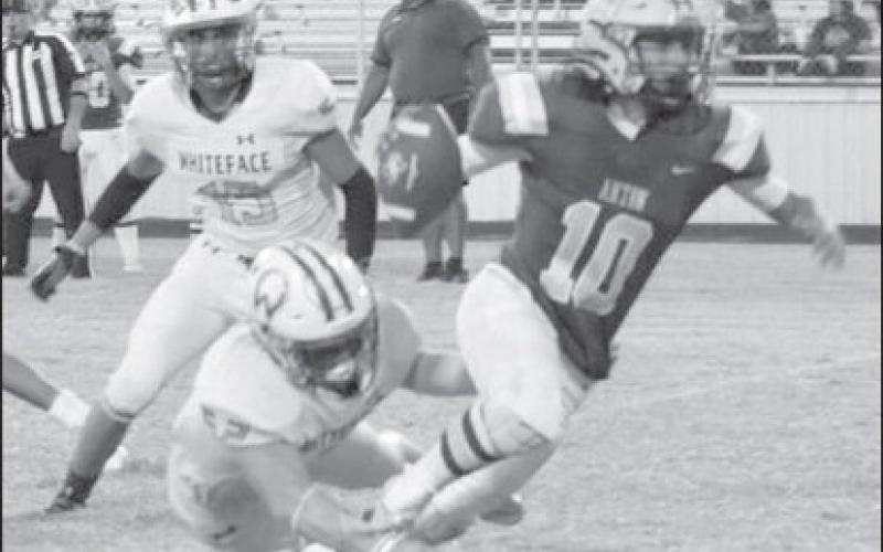 SLIPPERY - Gavin Martinez struggled for yardage in a 60-0 Anton homecoming loss to the Whiteface Antelopes in UIL Class 1A 6-man high school football action last Friday. The Bulldogs will be in Spur this Friday for a 7:30 game while Whiteface will host Wildorado for homecoming at 7:30 p.m. (Photo by Holly Crutcher)