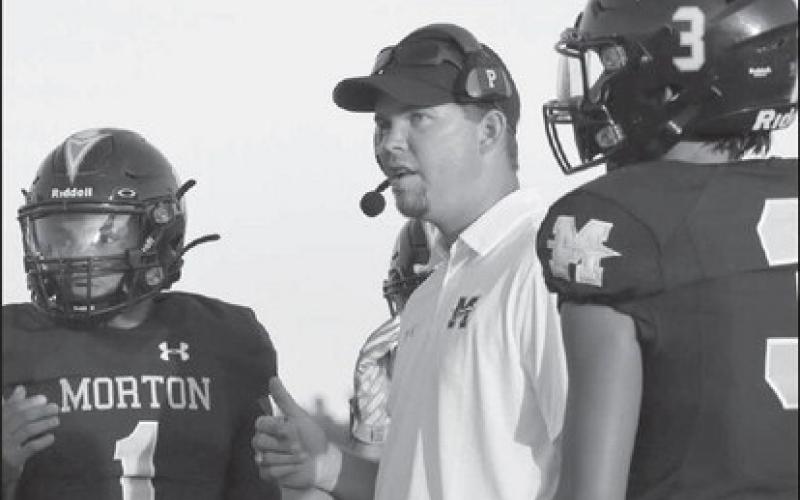 COACHING - Morton Head Football Coach and Athletic Director Keith Mauldin talked to his team during a timeout to get them focused. (Staff photo by Aalijah Soliz)
