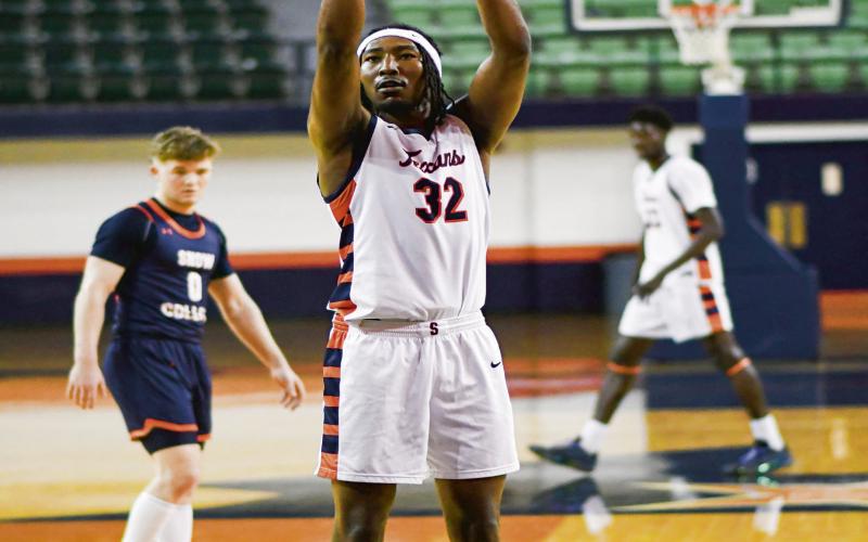 SANDLIN’EL AT THE LINE - South Plains College Texans forward Antallah Sandlin’el shoots from the free throw line during their game against Snow College earlier this month at the Texan Dome. Sandlin’el would score 25 total points on the Las Vegas road trip. (Staff photo by Jentezen Smith)
