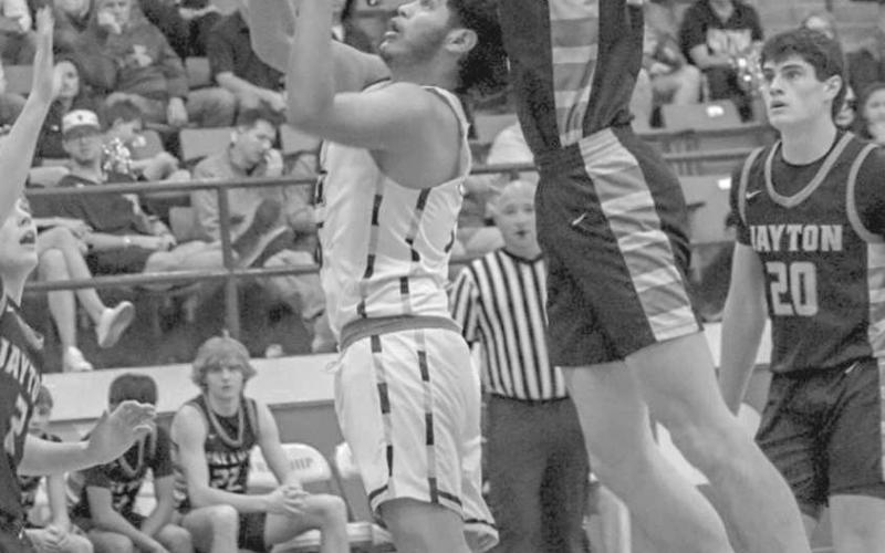 EASY LAYUP - Morton Indian Anibal Casteneda layed the ball up during the team’s contest against the Jayton Jaybirds this past Tuesday at Frenship HS for their regional quarterfinal matchup in basketball playoffs. (Staff photo by Aalijah Soliz)