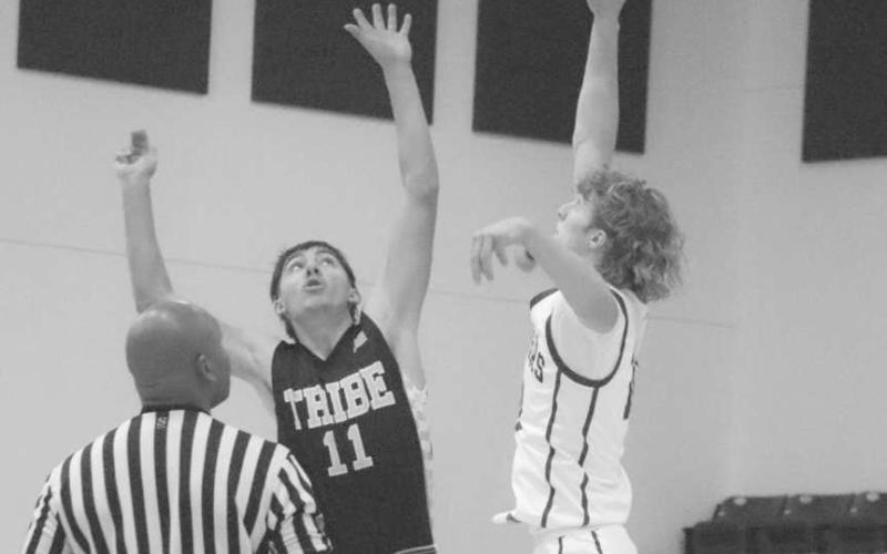 TIP OFF - Morton Indian A.J. Mendoza competed in the tip-off during the team’s game against the Cougars on the road in Klondike. (Staff photo by Aalijah Soliz)