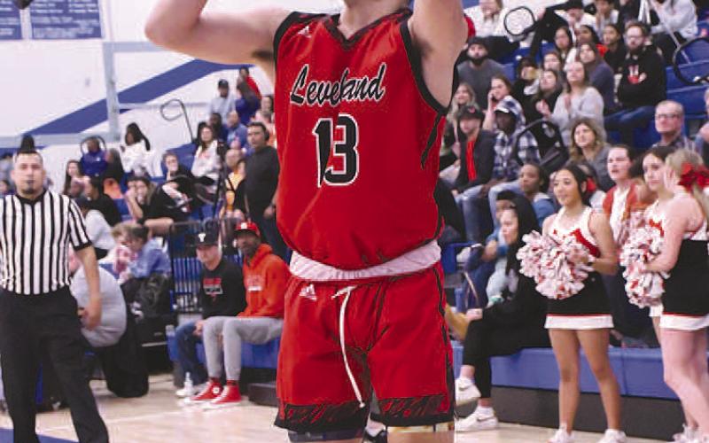 CORNER ATTEMPT- Moving to 1-1 in district play, the Levelland Lobos fell to the Estacado Matadors, 67-50, in Lubbock Tuesday. Lobo Neamiah Campos is pictured attempting a corner three during the contest. (Photo Courtesy of Edward Ramirez)