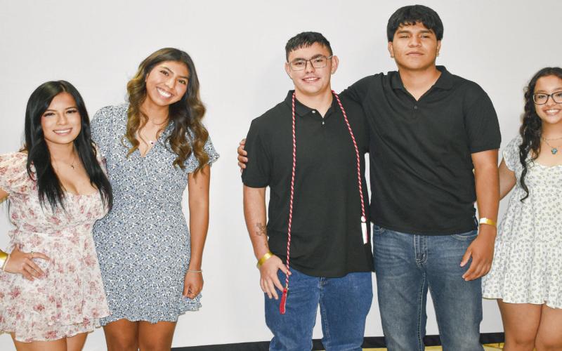 TENNIS AWARDS - Girls Most Valuable Player: Khloe Aguirre, Girls Fighting Heart: Natalie Hernandez, Boys MVP: Adrian Luevano and Boys Fighting Heart: Antonio Samaniego. (Staff photo by C.R. Calhoun)