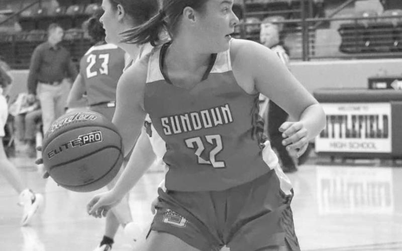 REBOUND - Sundown Roughette Hannah Holdman grabbed the loose ball after a missed shot in the teams game against the Olton Phillies last week. (Staff photo by Aalijah Soliz)