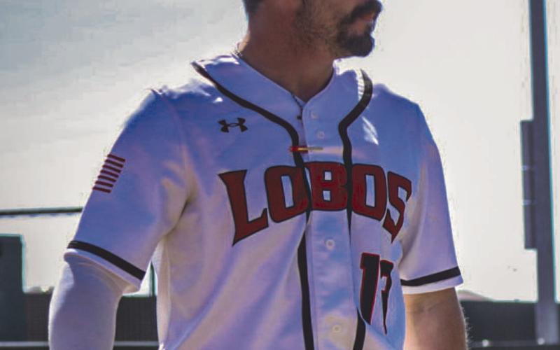GAME DAY - Levelland Head Baseball Coach Chris Portwood headed over to his team’s dugout this past Monday during the Lobos contest against the Denver City Mustangs. (Staff photo by Aalijah Soliz)