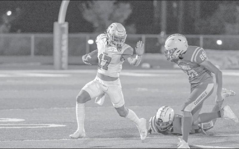 STIFF ARM - Ropes quarterback Hayden Torres made a good move in the open field during the teams contest in Eunice, New Mexico. The Eagles will have their next game this Friday against Ralls as the away team at 7 p.m. (Photo courtesy of Donovan Martin)