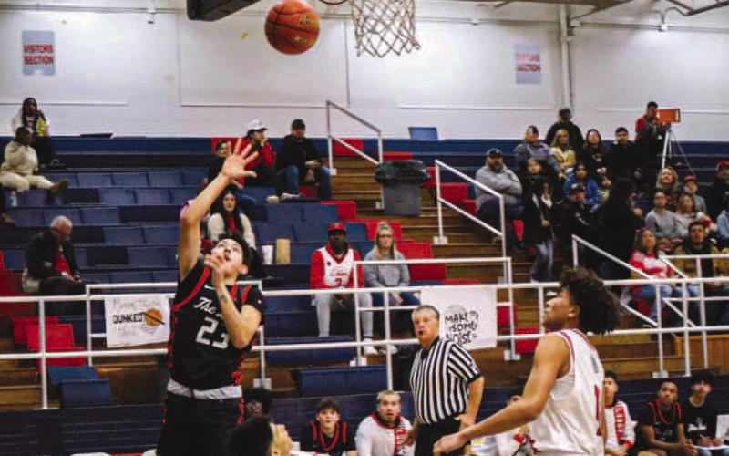 LAY-UP - Levelland athlete Ozzie Solano got the easy points off of a fast break from the Lobo defense. (Staff photo by Aalijah Soliz)