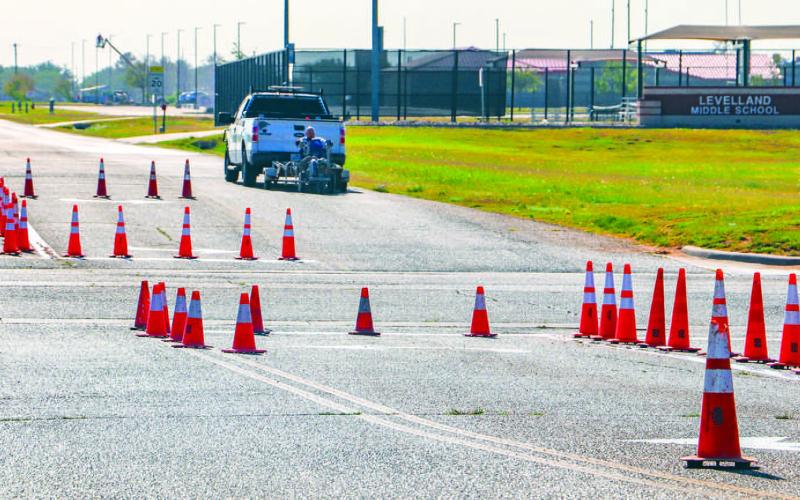 NEW STRIPING, NEW SCHOOLYEAR - Levelland ISD’s maintenance staff has been working on striping new lines around all their campuses ahead of the new school year starting later this month. (Photo courtesy of Emily Campos)